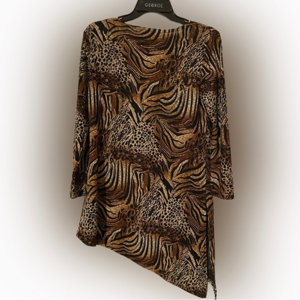 Asymmetrical form fitting dress.